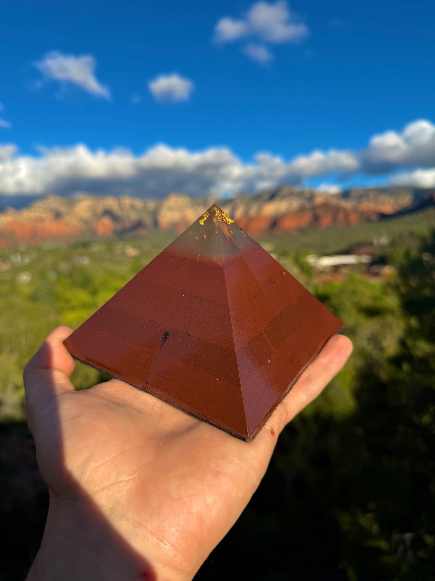 Green-glowing Red Sun Giza orgone pyramid, close-up view
