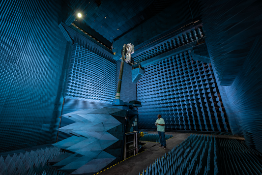 Military anechoic chamber interior lined with black pyramid-shaped RAM — the same electromagnetic absorption principle used in Orgonomy pyramids