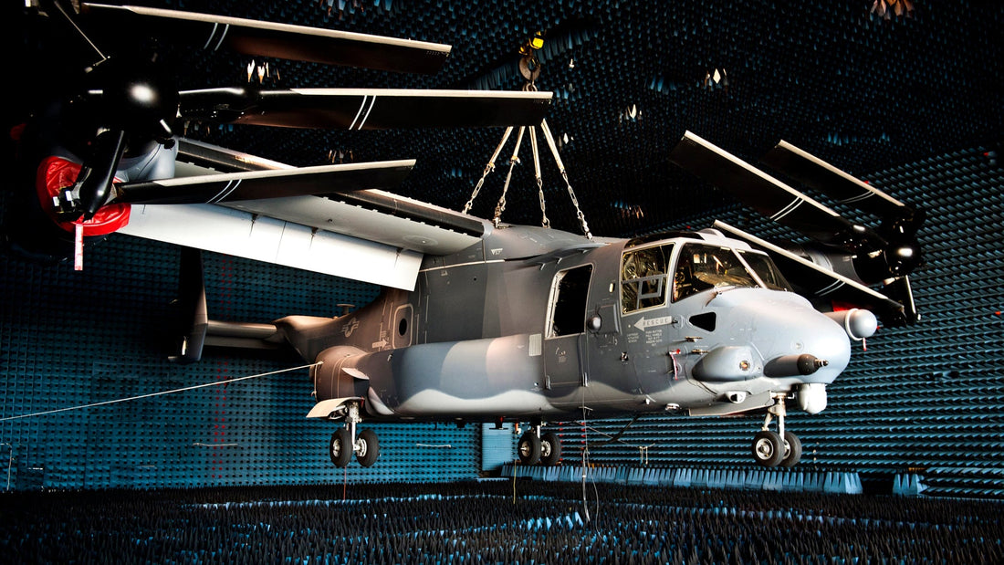US Air Force CV-22 Osprey aircraft inside a military anechoic chamber lined with black pyramidal RAM foam absorbers