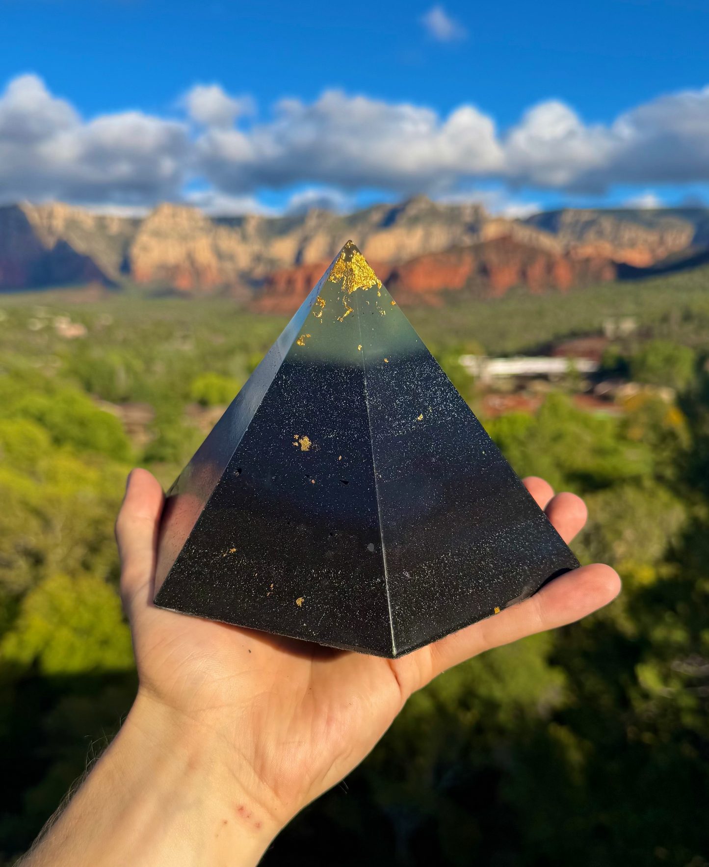 Green-glowing Black Sun Dodecahedron orgone pyramid with a 12-sided field, glows in the dark