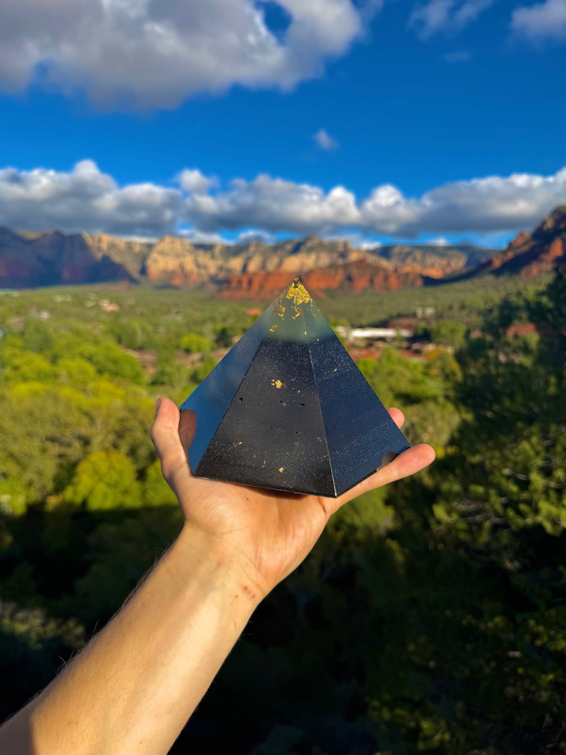 Green-glowing Black Sun Dodecahedron orgone pyramid, glowing in the dark
