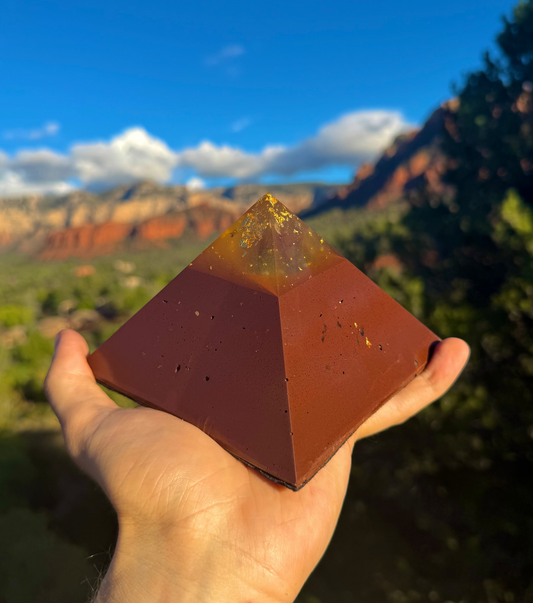 Solar Plexus Red Sun Giza orgone pyramid with a hematite base and gem-grade crystals