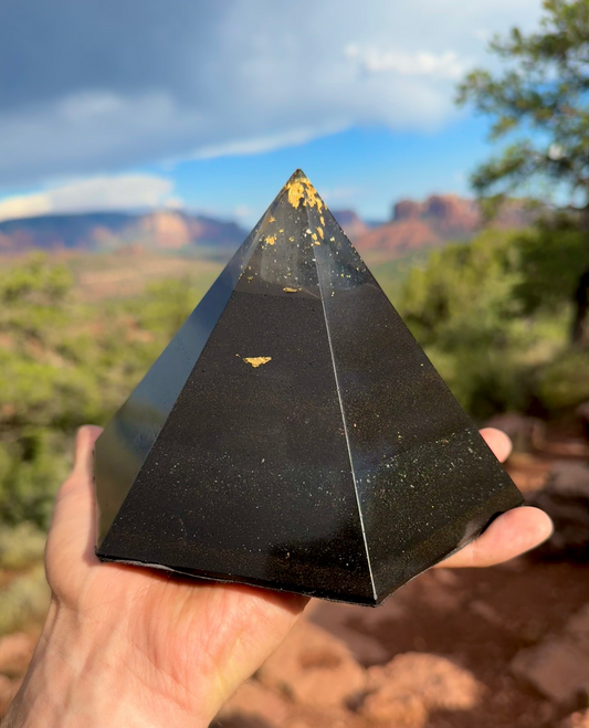 Black Sun Dodecahedron orgone pyramid with a 12-sided omnidirectional field and Lemurian quartz