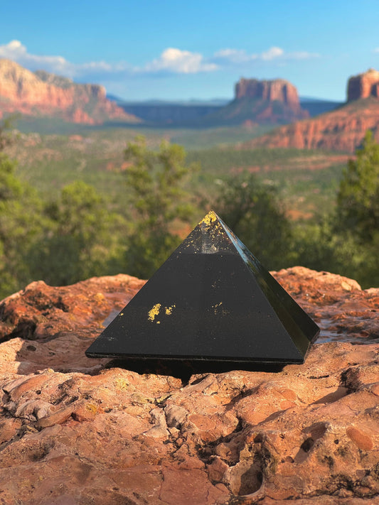 Medium Black Sun Giza orgone pyramid with a Lemurian quartz capstone and magnetite base