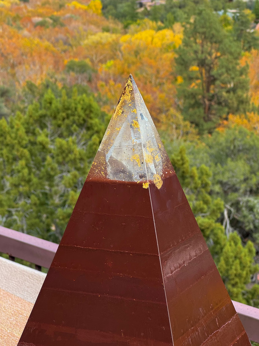 XXL 72-degree Red Sun Nubian orgone pyramid with a hematite base, Lemurian quartz, and 24K gold