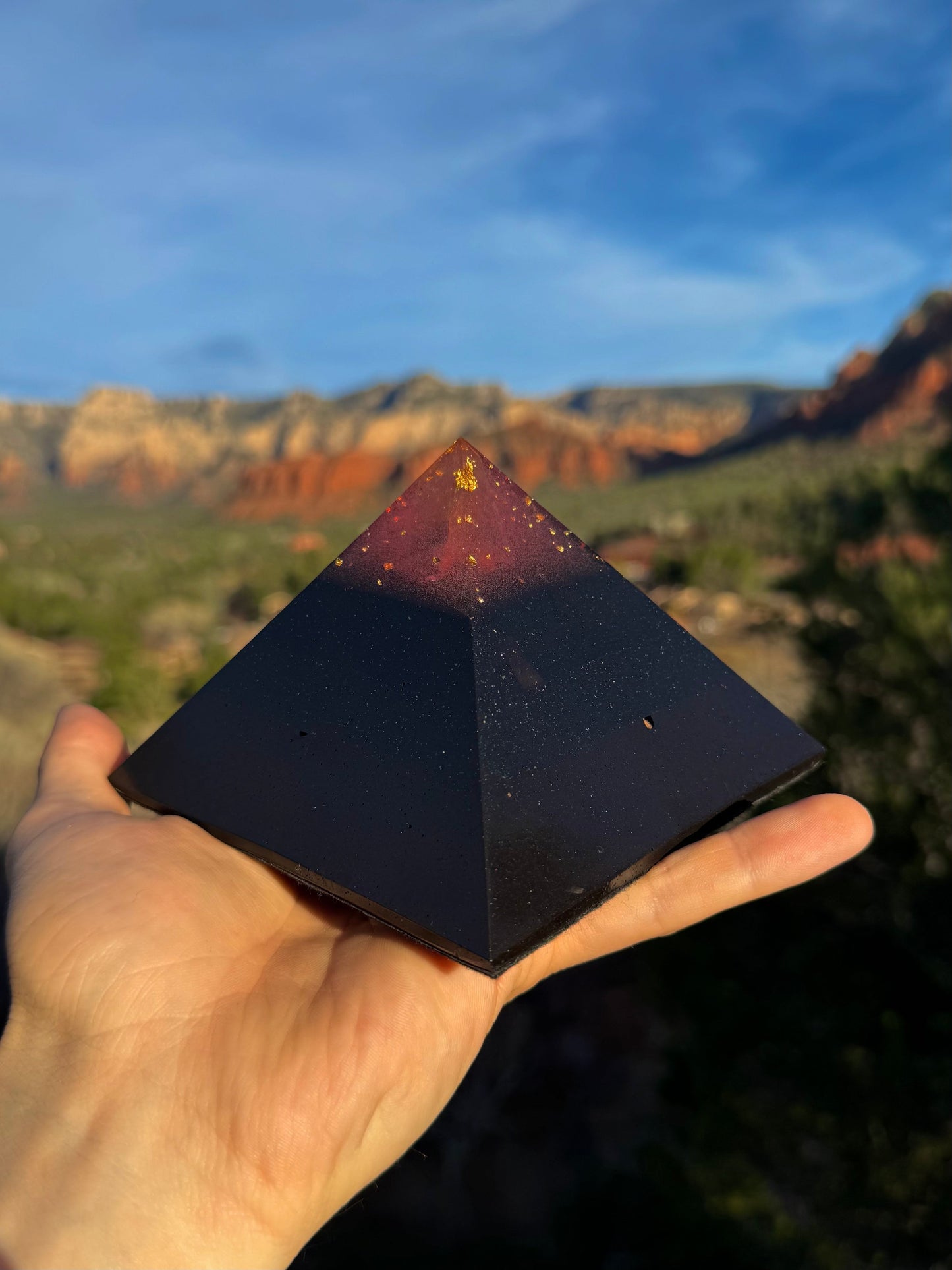 Titanium pink-tipped Black Sun Giza orgone pyramid, close-up view