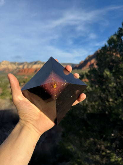Titanium pink-tipped Black Sun Giza orgone pyramid, shown to scale